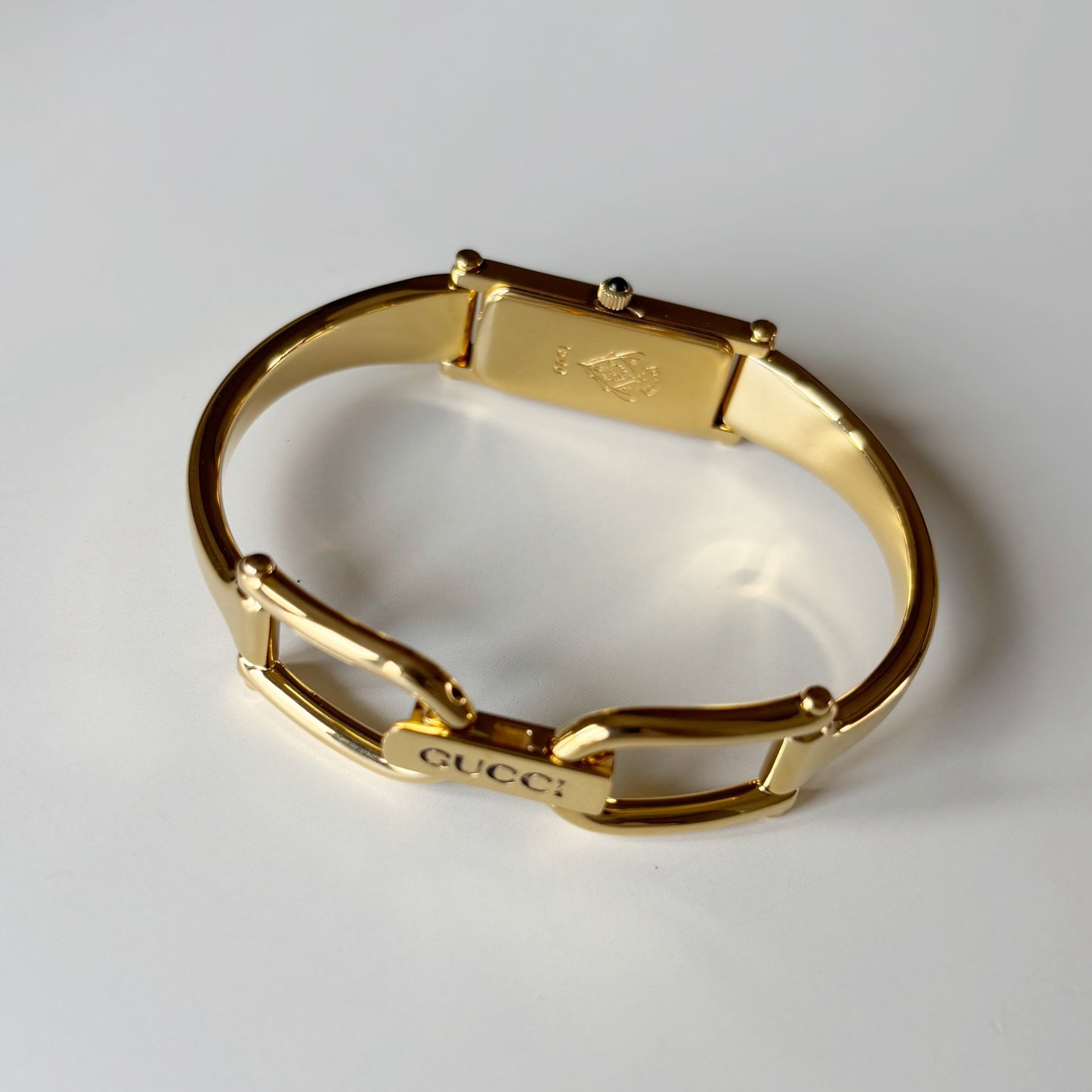 Gucci 1990s Black Rectangular Dial Gold Plated Bangle Watch