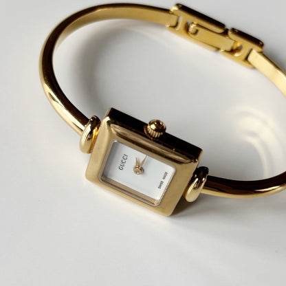 Gucci 1990s Square Dial Gold Plated Bangle Watch