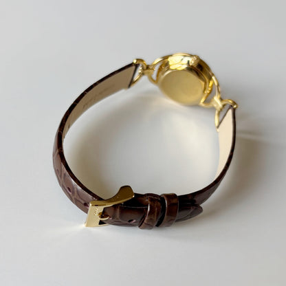 Gucci 1990s Gold Round Dial Horsebit Gold Plated Watch