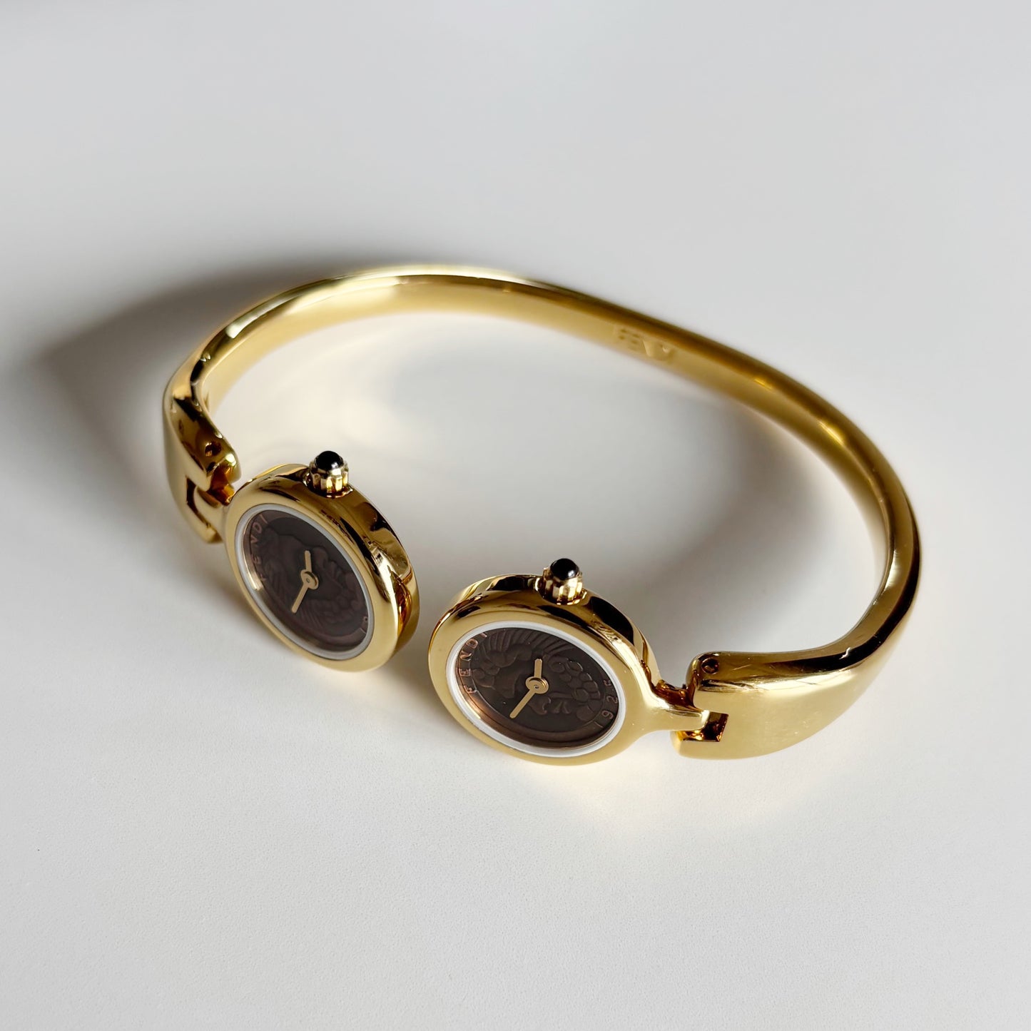 Fendi 1990s Seashell Dial Two Time Zone Gold Plated Bangle Watch