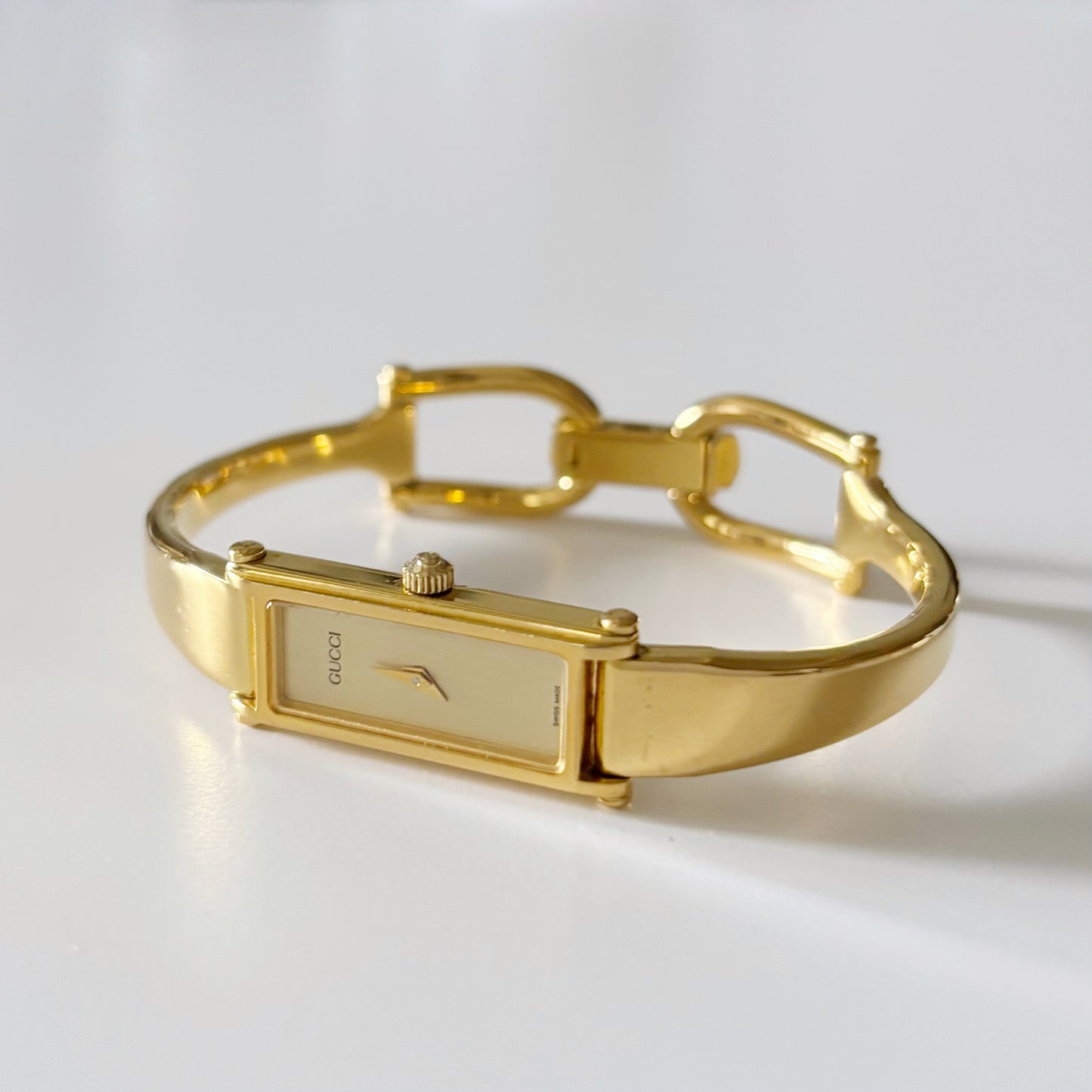 Gucci 1990s Gold Dial Rectangular  Gold Plated Bangle Watch
