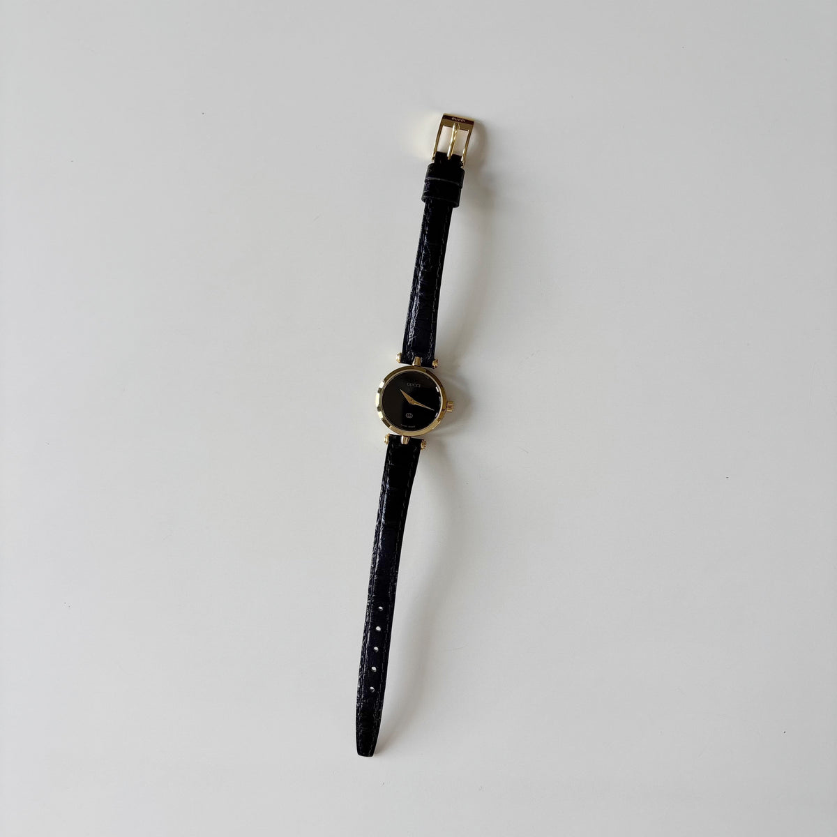 Gucci 1980s Black Dial Round Gold-Plated Watch