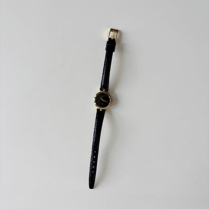 Gucci 1980s Black Dial Round Gold-Plated Watch