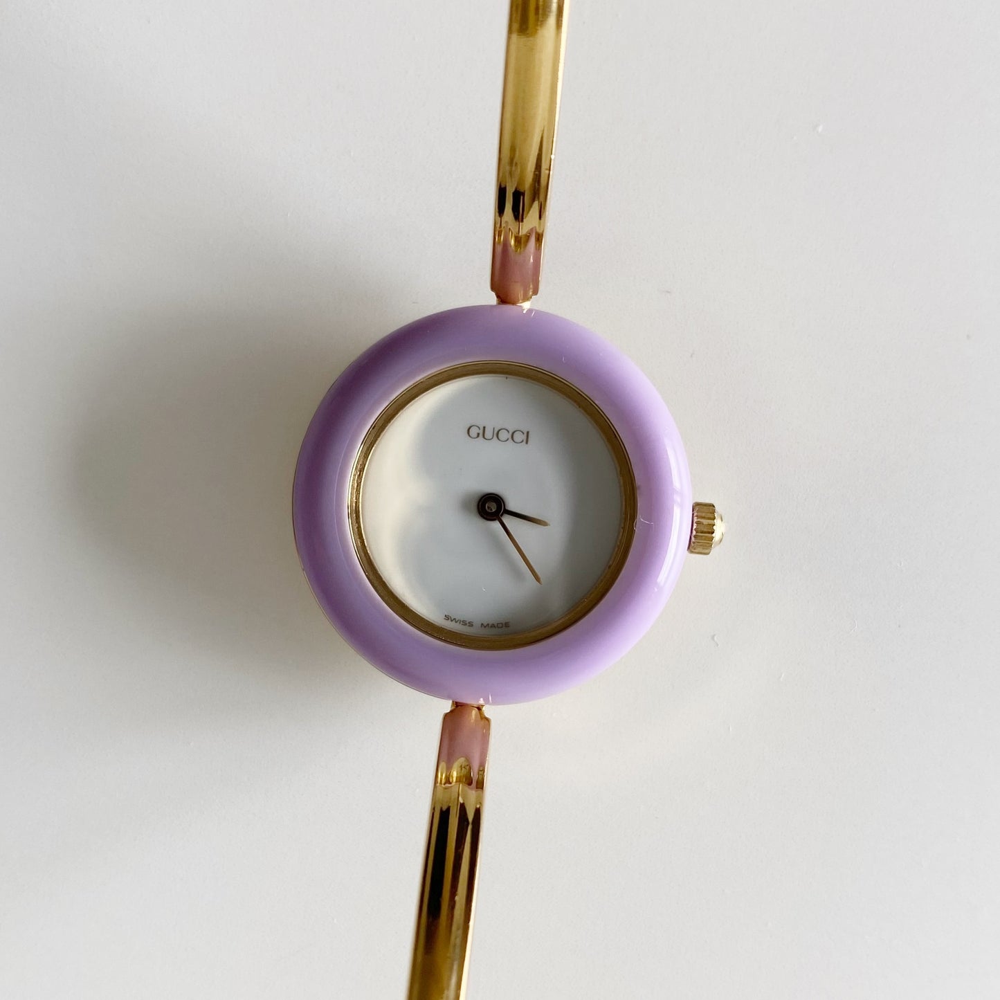 Gucci 1990s Interchangeable Bezel Gold Plated Bangle Watch with 12 bezels, case