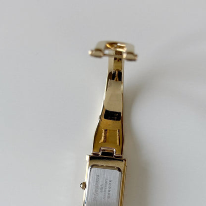 Yves Saint Laurent 1990s Peek a boo Gold Plated Bangle Watch