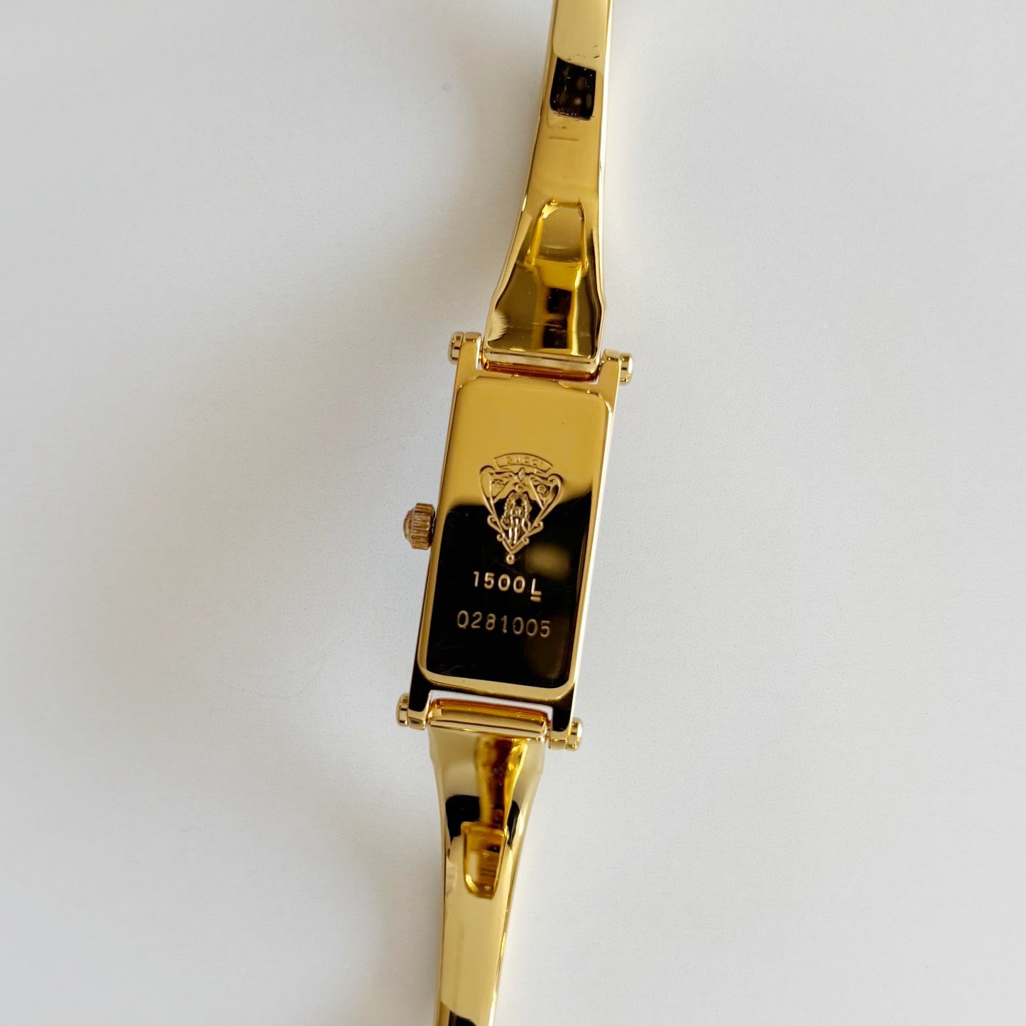 Gucci 1990s Black Rectangular Dial Gold Plated Bangle Watch