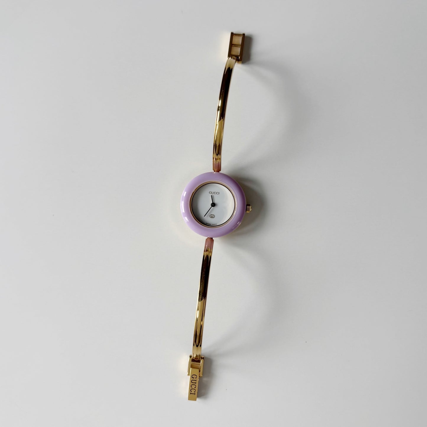 Gucci 1990s Interchangeable Bezel Gold Plated Bangle Watch with 12 bezels, case