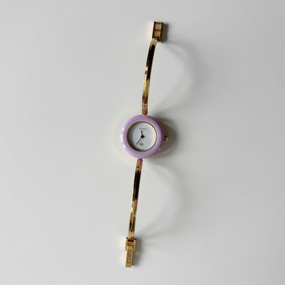 Gucci 1990s Interchangeable Bezel Gold Plated Bangle Watch with 12 bezels, case