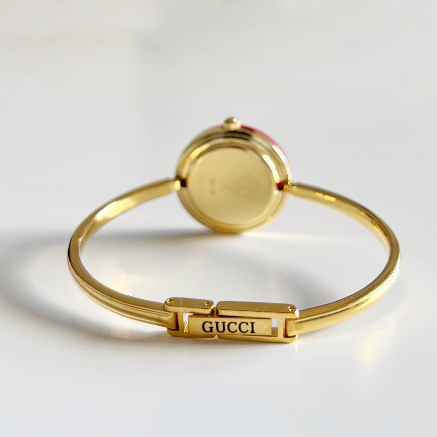 Gucci 1990s Interchangeable Bezel Gold Plated Bangle Watch with 12 bezels, case