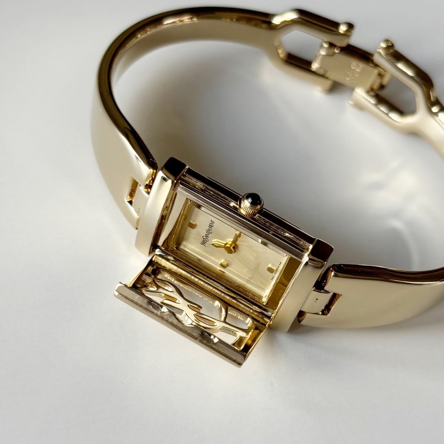 Yves Saint Laurent 1990s Peek-A-Boo Gold Plated Bangle Watch