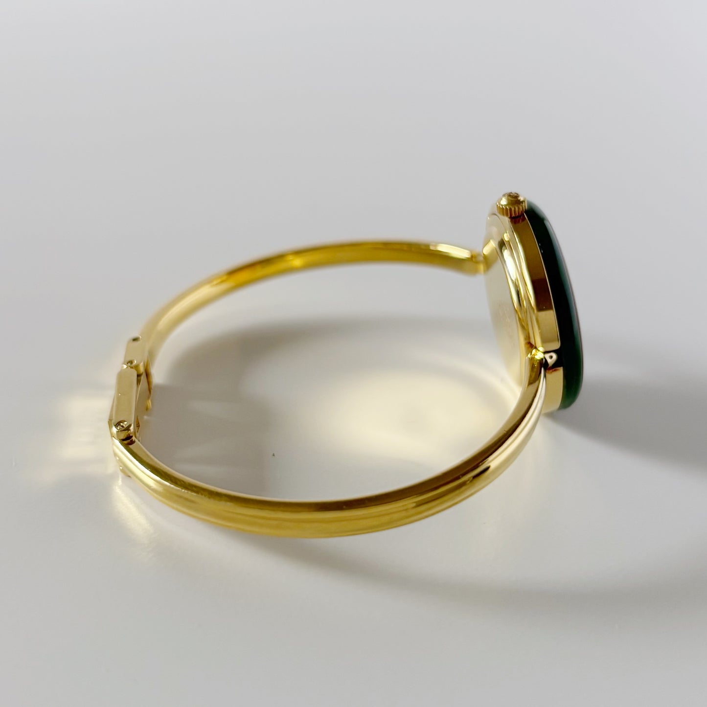 Gucci 1990s Interchangeable Bezel Gold Plated Bangle Watch with 12 bezels, case