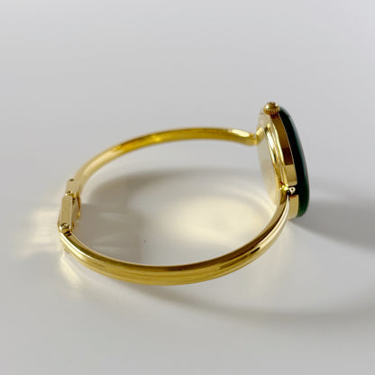 Gucci 1990s Interchangeable Bezel Gold Plated Bangle Watch with 12 bezels, case