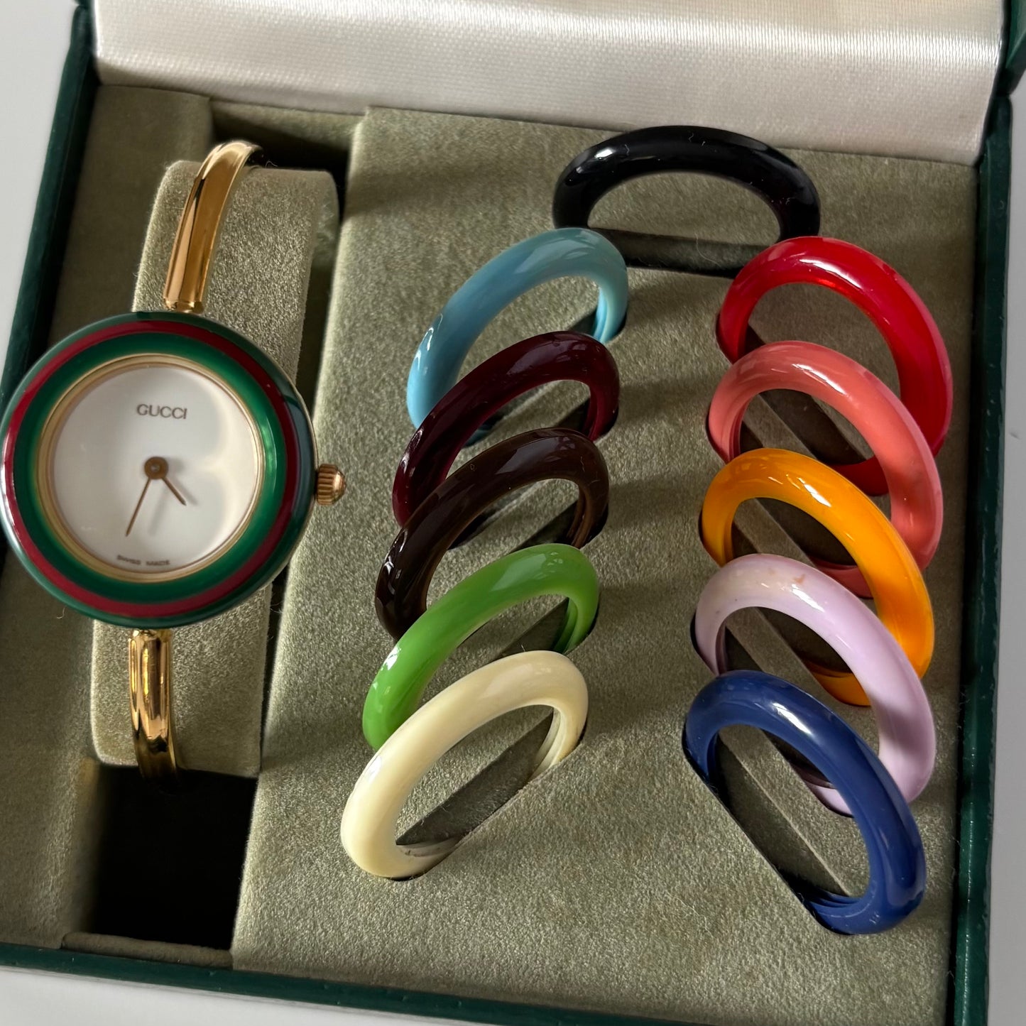 Gucci 1990s Interchangeable Bezel Gold Plated Bangle Watch with 12 bezels, case
