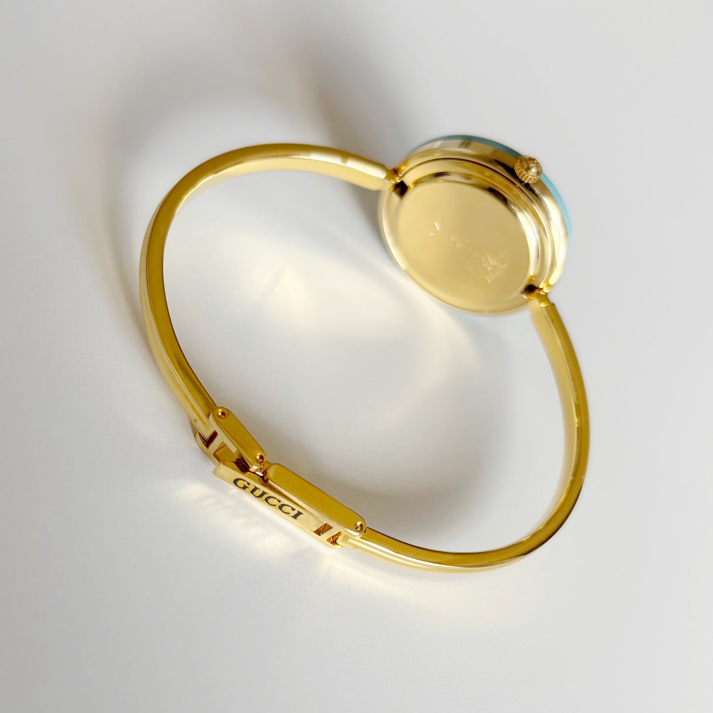 Gucci 1990s Interchangeable Bezel Gold Plated Bangle Watch with 12 bezels, case