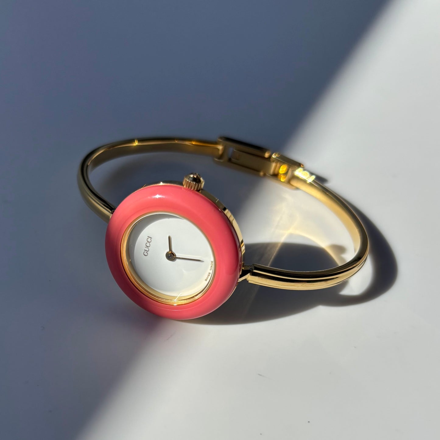 Gucci 1990s Interchangeable Bezel Gold Plated Bangle Watch with 12 bezels, case