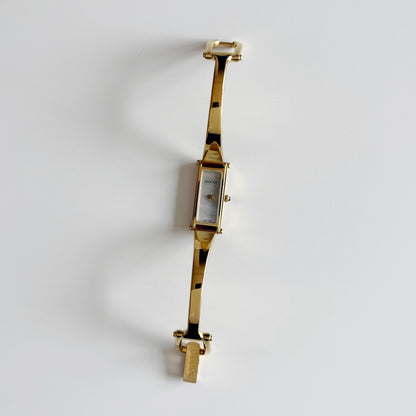 Gucci 1990s Seashell Gold Plated Bangle Watch