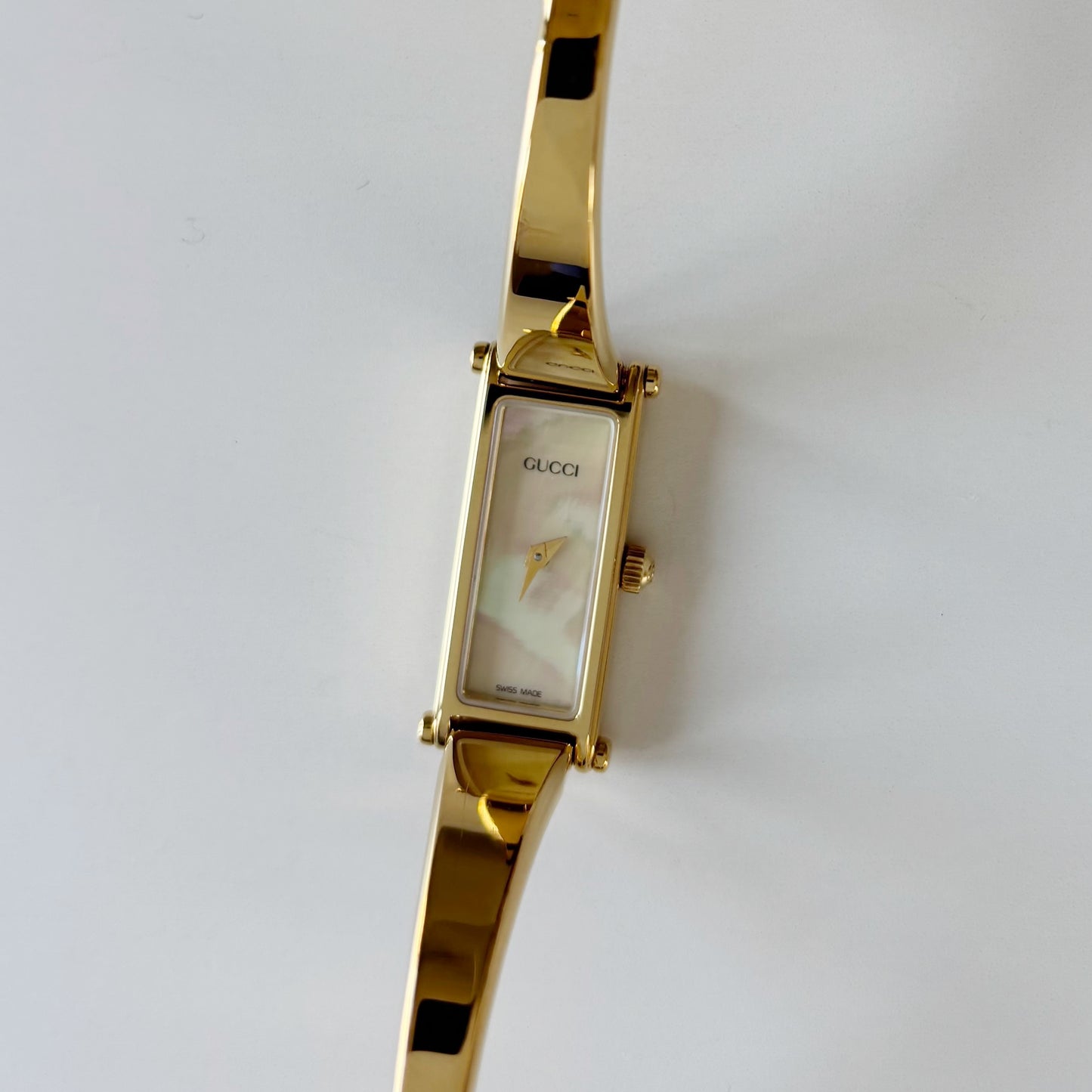 Gucci 1990s Seashell Rectangular Dial Gold Plated Bangle Watch