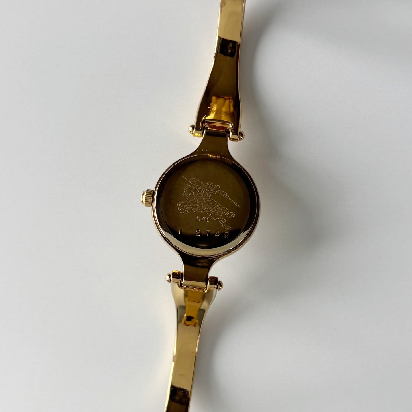 Burberry 1990s Round Dial Gold Plated Bangle Watch