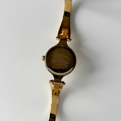 Burberry 1990s Round Dial Gold Plated Bangle Watch
