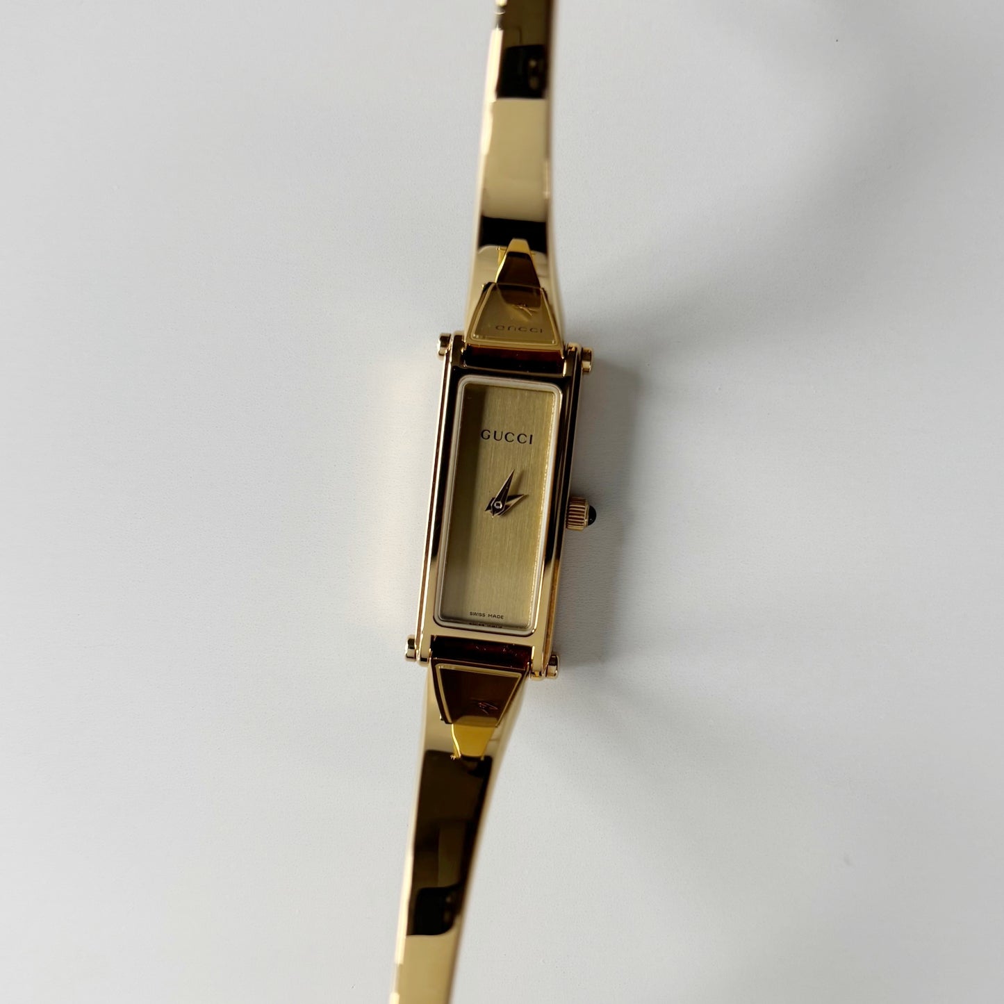 Gucci 1990s Gold Rectangular Dial Gold Plated Bangle Watch