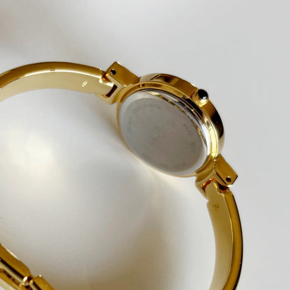 Yves Saint Laurent 1990s Seashell Dial Gold Plated Bangle Watch (Small)