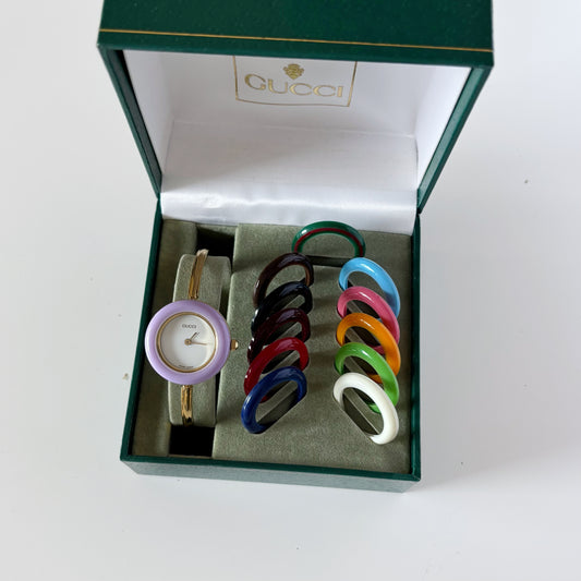 Gucci 1990s Interchangeable Bezel Gold Plated Bangle Watch with 12 bezels, case