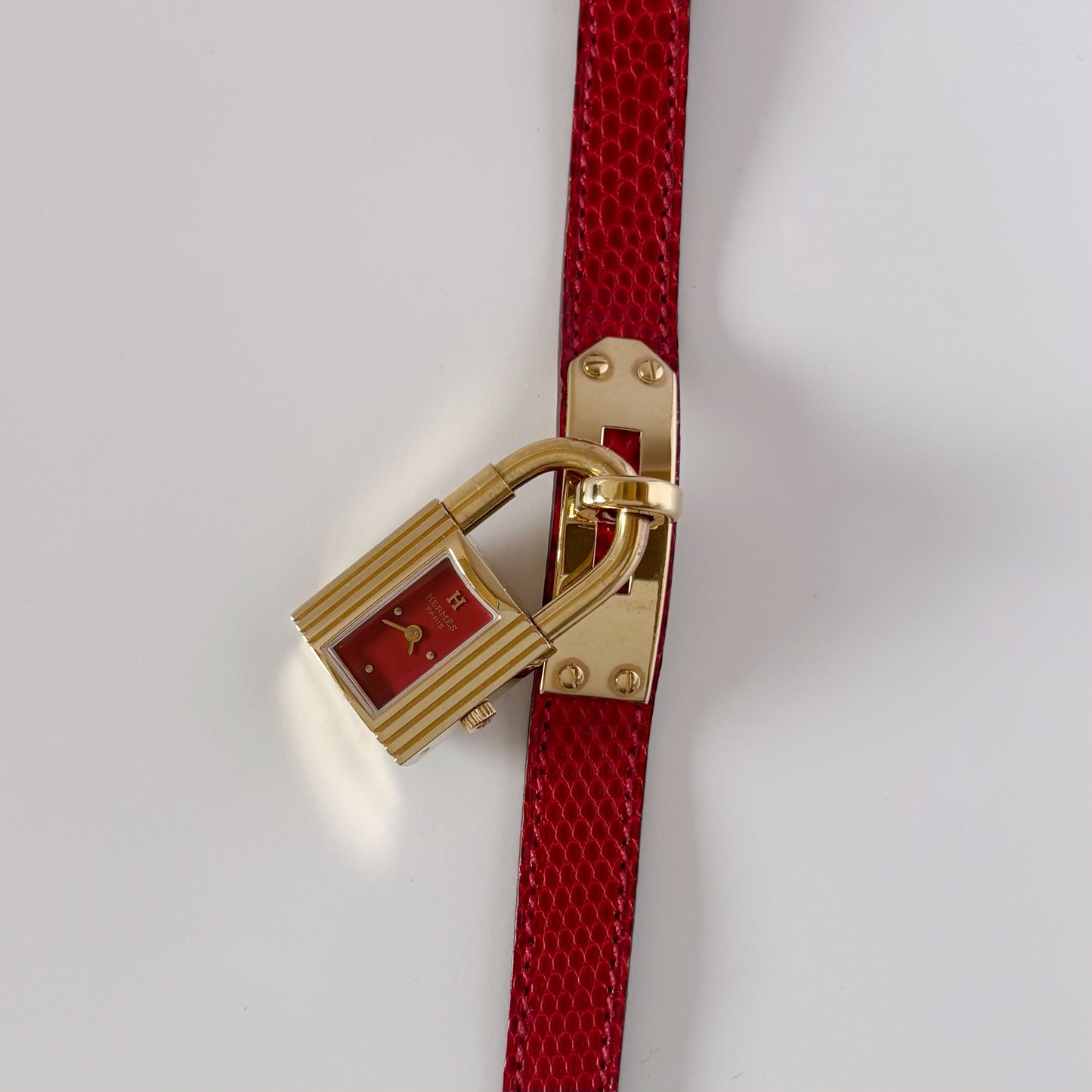 Hermes 1990s Kelly Red Dial Gold Plated Watch