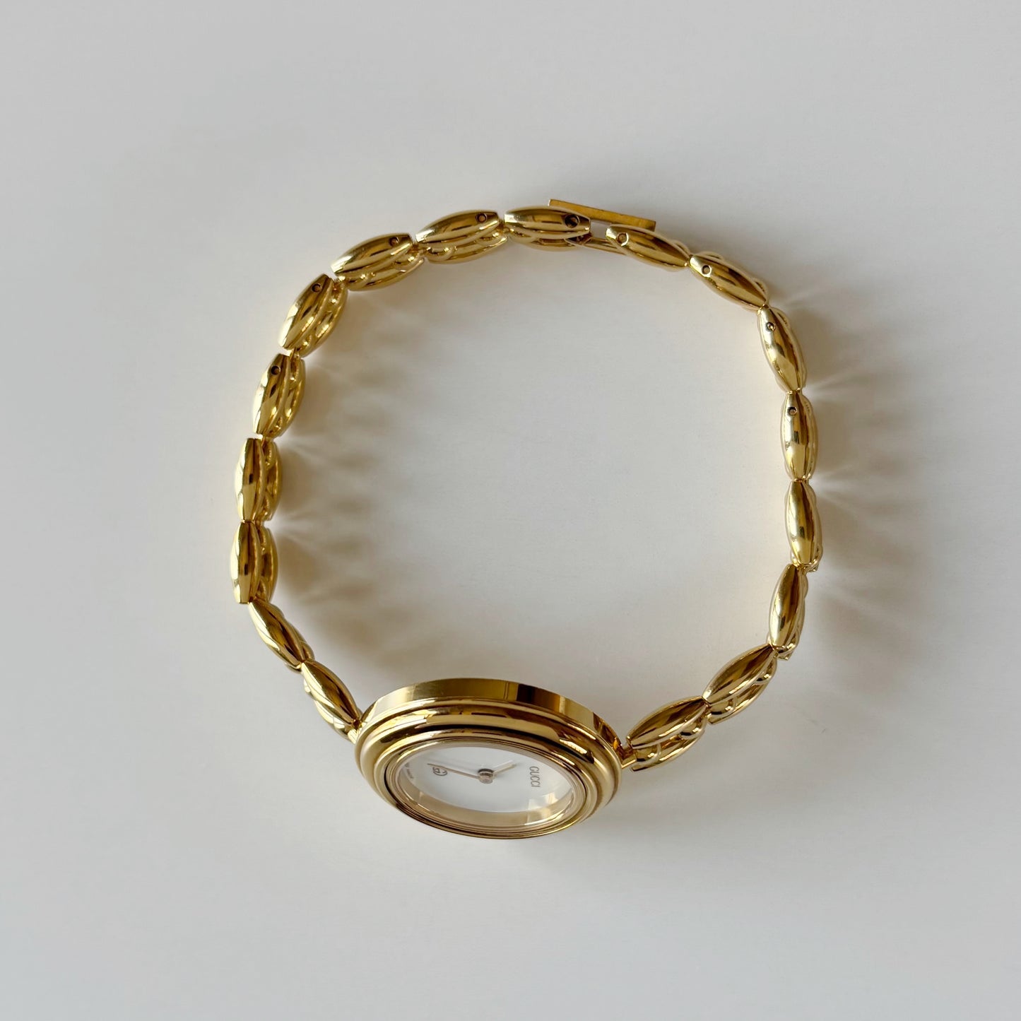 Gucci 1990s Interchangeable Bezel Gold Plated Rice Chain Watch with case, 6 bezels (165mm)