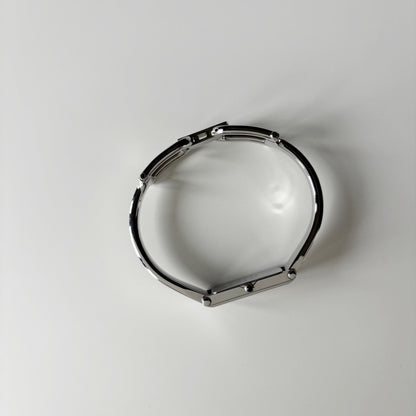 Gucci 1990s Rectangular Dial Silver Bangle Watch