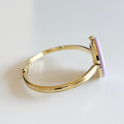 Gucci 1990s Interchangeable Bezel Gold Plated Bangle Watch with 12 bezels, case