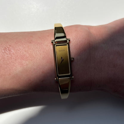 Gucci 1990s Gold Rectangular Dial Gold Plated Bangle Watch