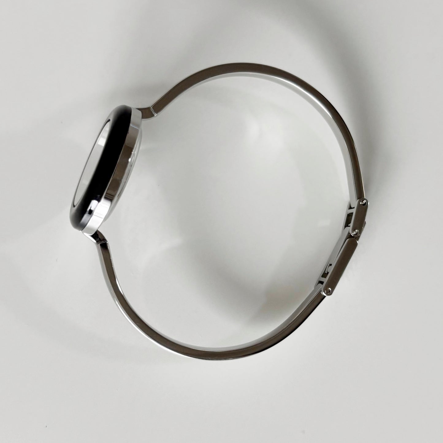 Gucci 1990s Interchangeable Bezel Stainless steel Bangle Watch with 12 bezels, case