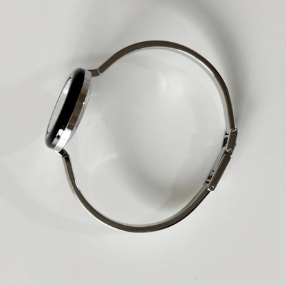 Gucci 1990s Interchangeable Bezel Stainless steel Bangle Watch with 12 bezels, case
