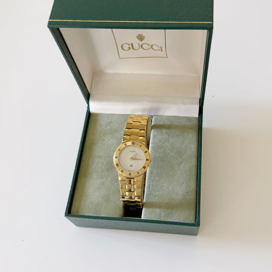 Gucci 1990s Gold Plated Round Watch