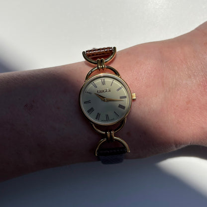 Gucci 1990s Round Cream Dial Horsebit Gold Plated Watch
