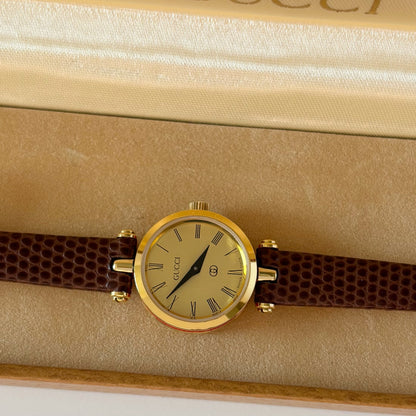 Gucci 1990s Round Gold Dial Gold Plated Watch