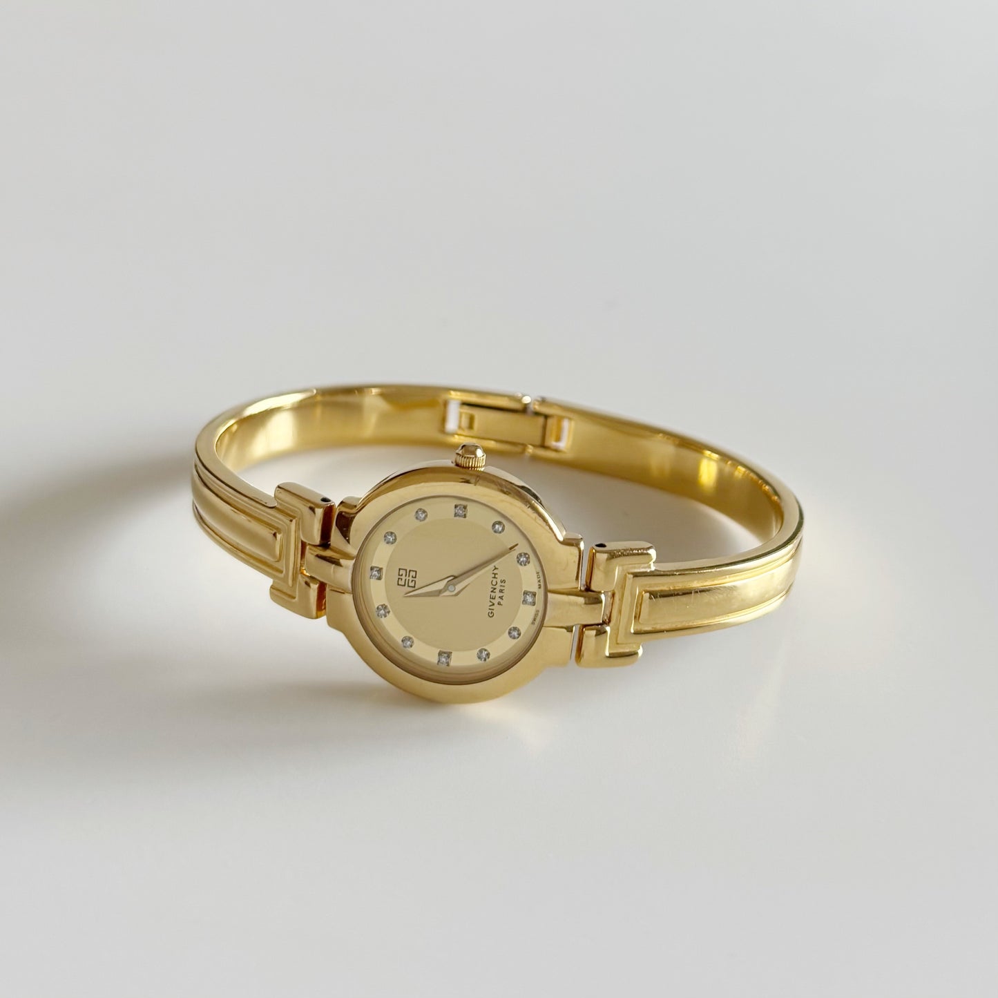 Givenchy 1990s Round Dial Gold Plated Bangle Watch