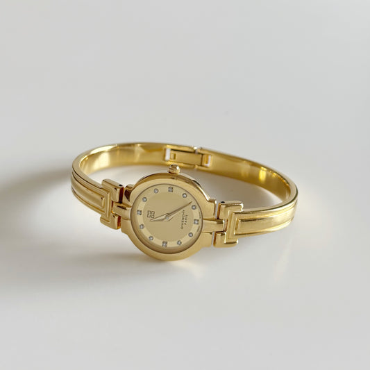 Givenchy 1990s Round Dial Gold Plated Bangle Watch