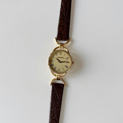 Gucci 1990s Gold Round Dial Horsebit Gold Plated Watch