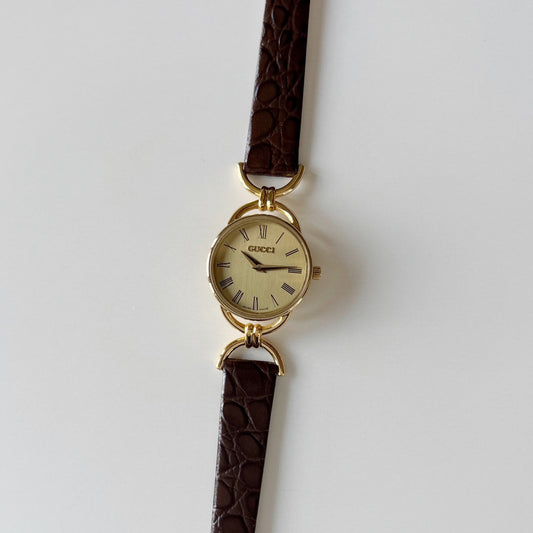 Gucci 1990s Gold Round Dial Horsebit Gold Plated Watch