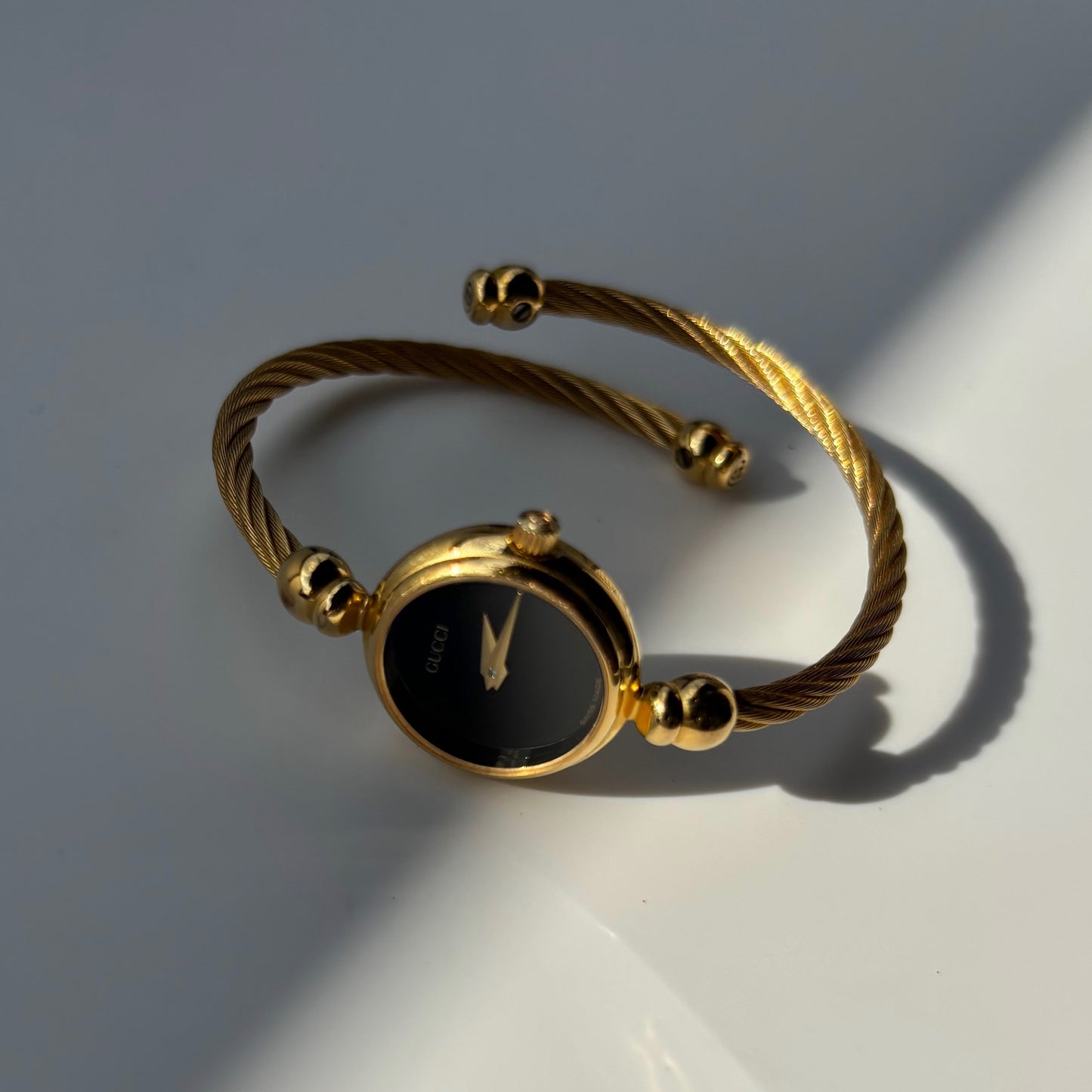 Gucci 1990s Black Dial Gold Plated Cable Bangle Watch